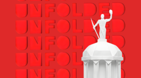 red block of text reading unfolded with origami style image of a dome with a soldier atop it 