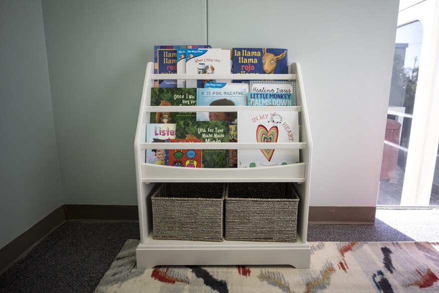 A bookshelf with children's books