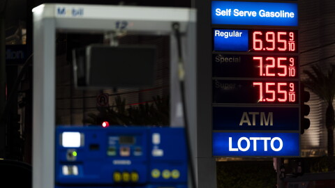 FILE - Prices are displayed at a Mobil gas station in West Hollywood, Calif.