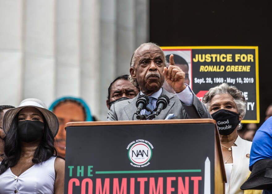 The Rev. Al Sharpton said, 'We didn't come out and stand in this heat because we didn't have nothing to do. We come to let you know, if we will come out by these numbers in the heat ... that we will stand in the polls all day long.'