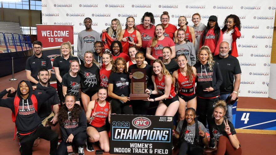 Redhawk Women photo with OVC Championship trophy.