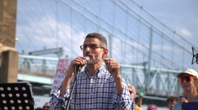 Imam Ayman Soliman speaks at an Oct. 18, 2025 rally in Cincinnati protesting the policies of the Trump administration.