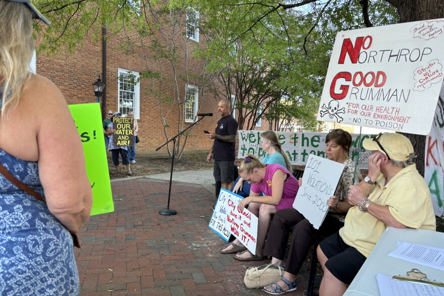 Milio Curcio, an Augusta County resident whose seven-acre homestead abuts Northrop Grumman, speaks at Monday's protest.