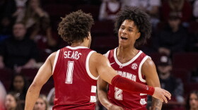 Alabama guard Aden Holloway (2) celebrates with guard Mark Sears (1) against South Carolina during the first half of an NCAA college basketball game on Wednesday, Jan. 8, 2025, in Columbia, S.C. (AP Photo/Scott Kinser)