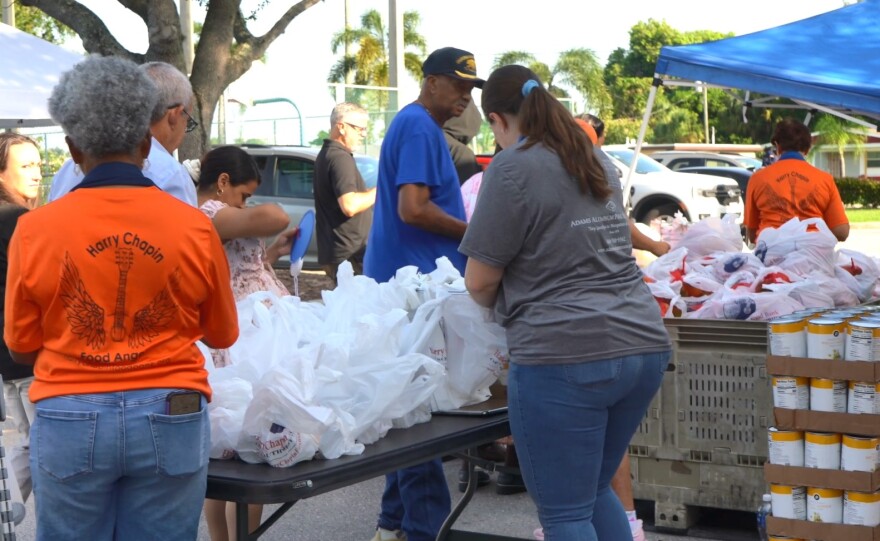 Florida Power & Light and Harry Chapin Food Bank provided energy tips and advice at the food bank's s weekly food distribution at the STARS Complex, the event provided local residents with practical, easy-to-install energy-efficiency tools and information about FPL programs designed to help customers manage their summer energy costs.