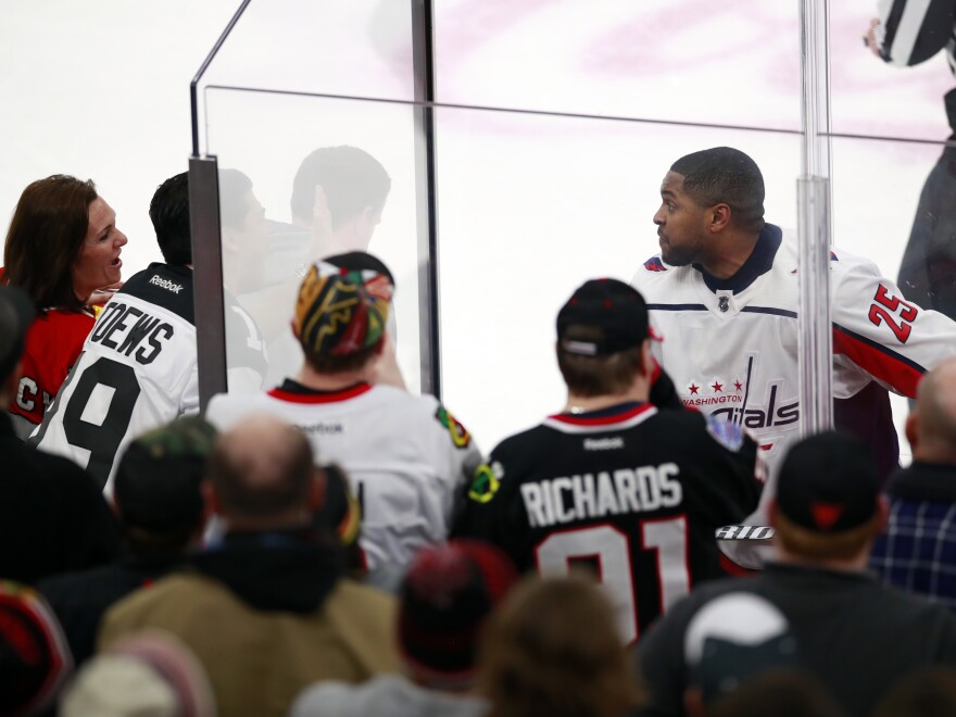 Washington Capitals right wing Devante Smith-Pelly (25) approaches Chicago Blackhawks fans who were racially taunting him during a game in Chicago.