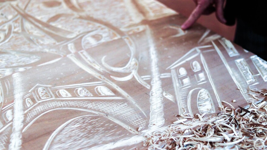 The urban landscape within Perkins woodblock shows the canals of Venice, the home of the Renaissance painter she drew inspiration from for this image. Thomas Iacobucci/WUSF Public Media