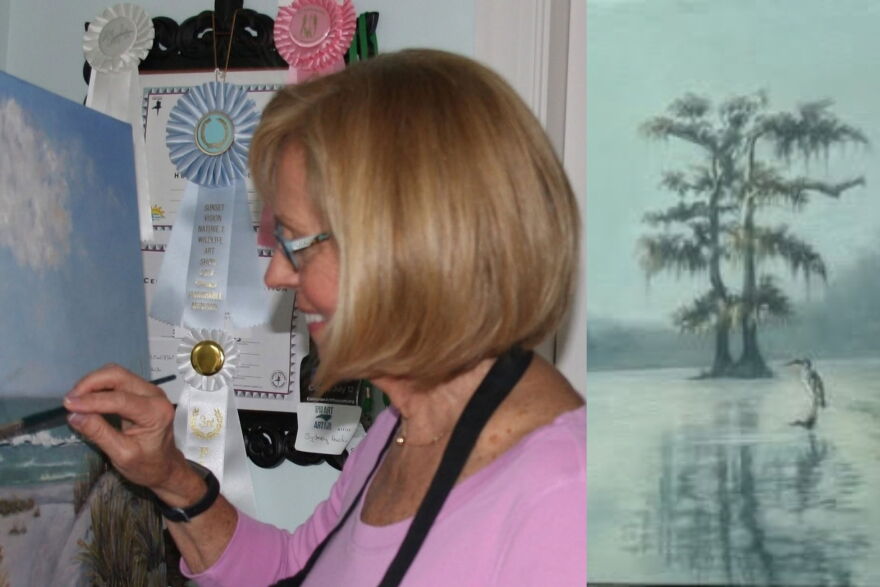 Sydney F. Austin and one of her paintings. (Contributed)