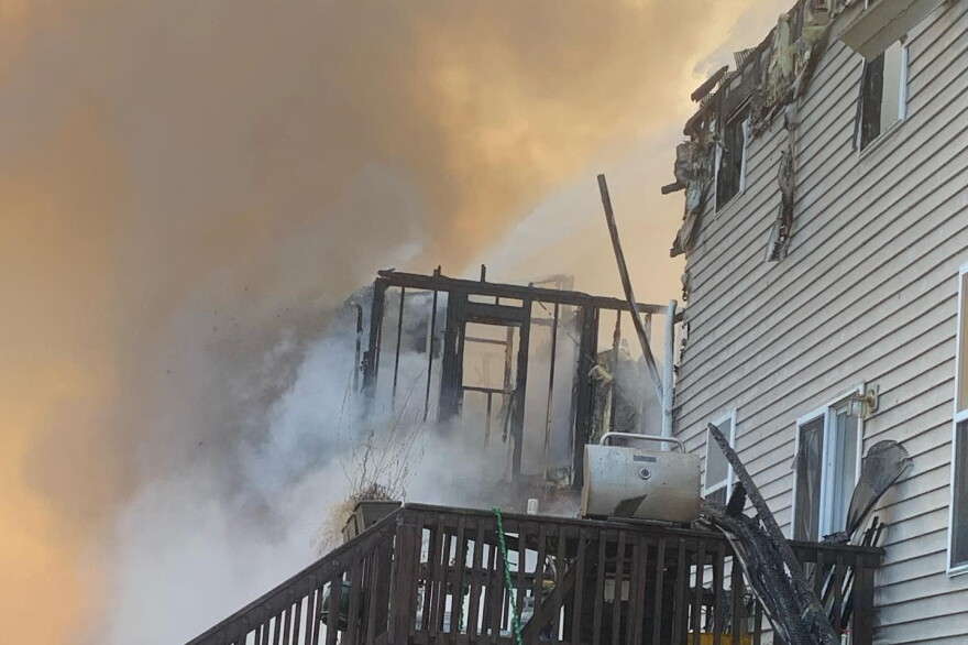 An image of the fire that consumed one house and damaged four others on S Wickens St. in Bloomington.