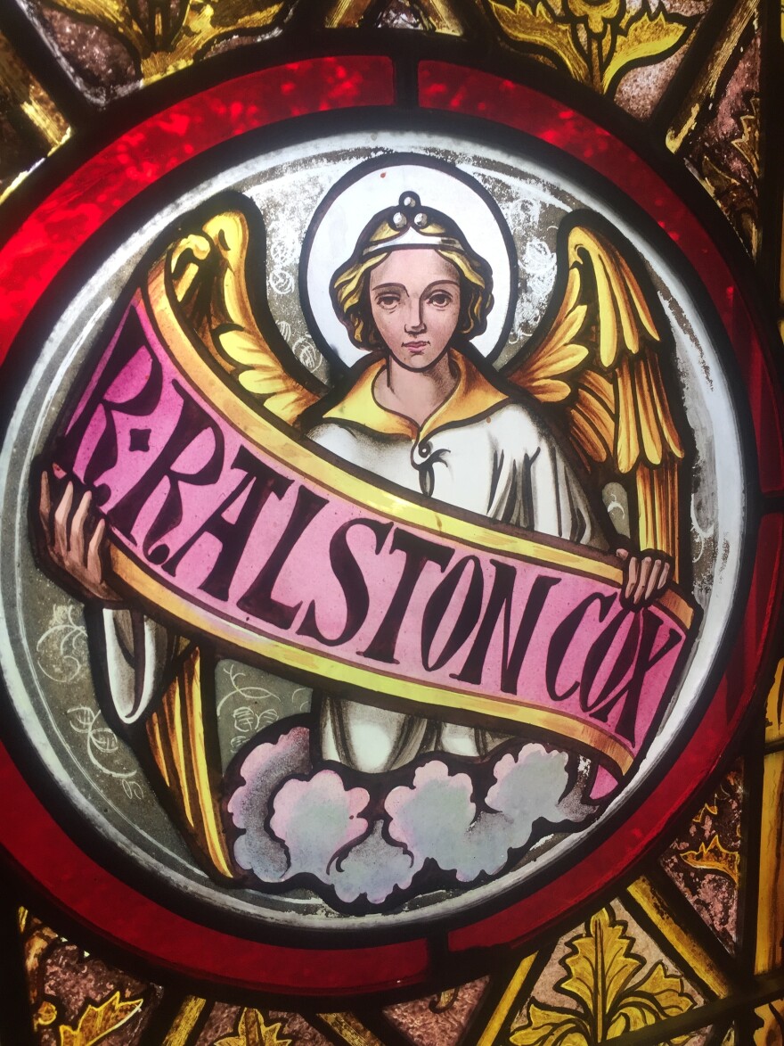 A stained glass window in St. John Chrysostom church honors Ralston Cox, the young seminarian whose dream it was to establish it. He drowned before he could see it built in 1851.