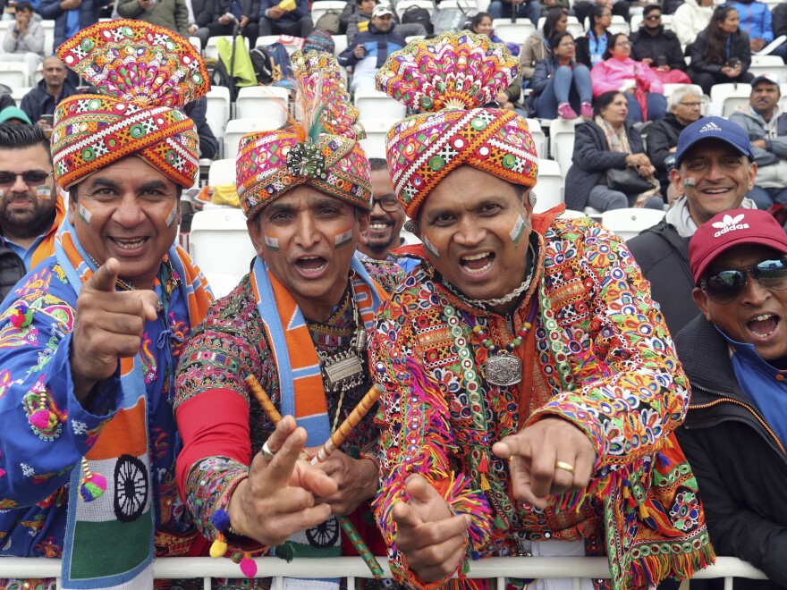 India's fans await the start of Thursday's Cricket World Cup match between India and New Zealand in Nottingham, England.