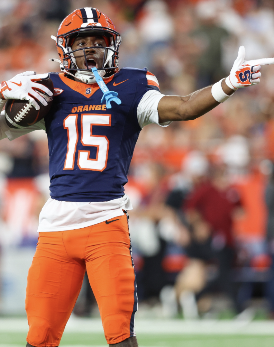 Darrell Gill Jr. (Blue, 15) gesturing for a first down after a reception