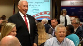 U.S. Rep. Greg Pence (R-6th District), standing, talks with constituents at a Chamber of Commerce lunch in Muncie in August 2019