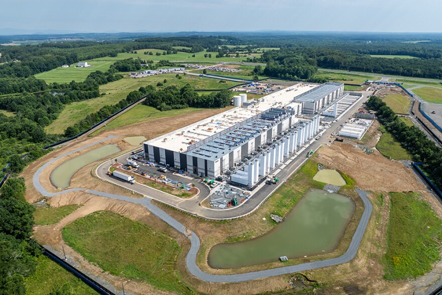 Observers say Florida's electric power giant NextEra is trying to cash-in on growing demand for electricity in Virginia — sparked by data centers.