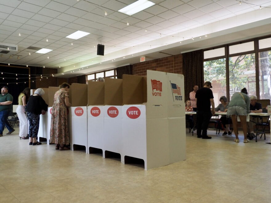 Voters mark their ballots in the Crown Heights Christian Church on June 16, 2026 in Oklahoma City.