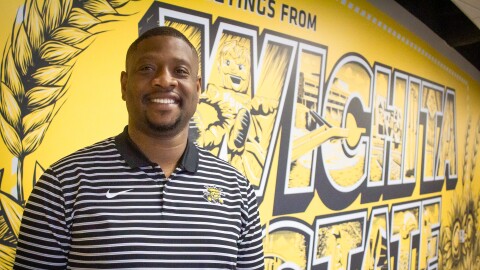Jamarco Clark poses for a photo on Wichita State University’s main campus. Clark was recently named the new vice president of student affairs at WSU.