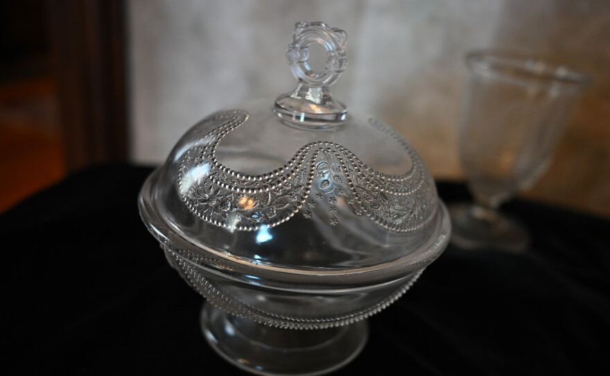 A glass jar with a bunting design around the lid