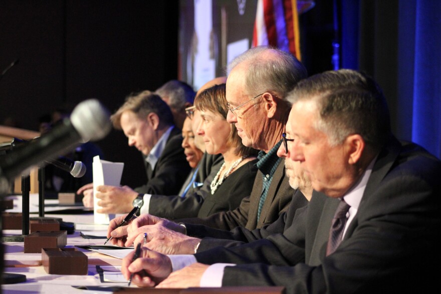 Western water officials sign documents in Las Vegas.