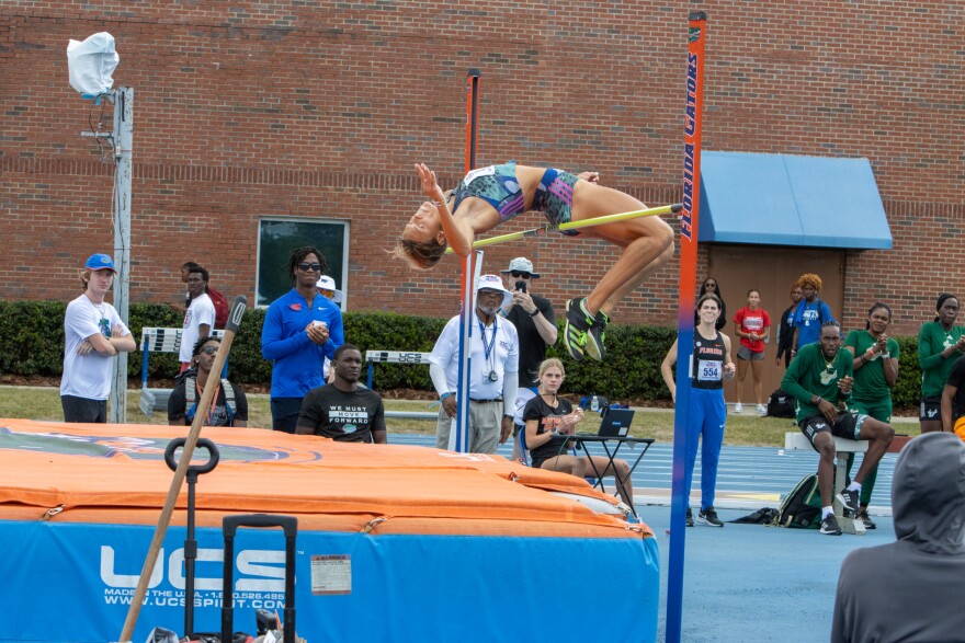 Anna Hall, adidas athlete, attempts a high jump during the Pepsi Florida Relays at James G. Pressly stadium in Gainesville, Fla., April 1, 2023. (Rae Riiska/WUFT News)