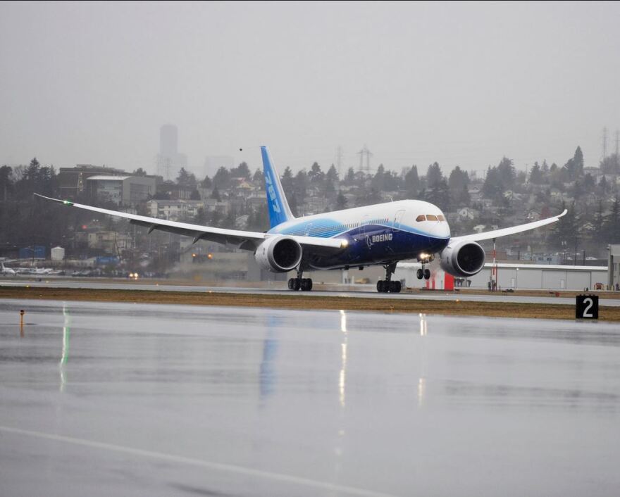 The Boeing 787 lands at Seattle's Boeing Field after its maiden flight from Paine Field in Everett.