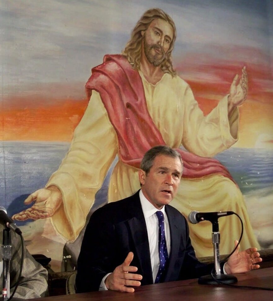 Then-Texas Gov. George W. Bush speaks in front of a painting of Jesus Christ during a campaign stop in Colfax, Iowa in 2000. Bush is the only Republican to win Iowa since 1976 and become president.