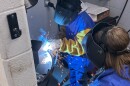 Students at Roanoke City Public Schools' Dream It, Build It, Work It camp demonstrate welding.