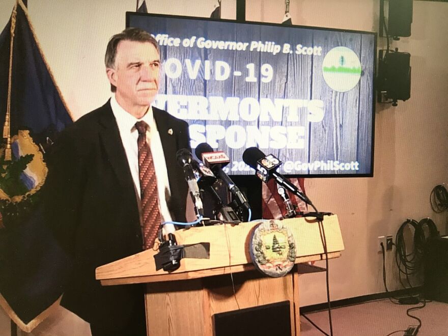 Phil Scott at a podium