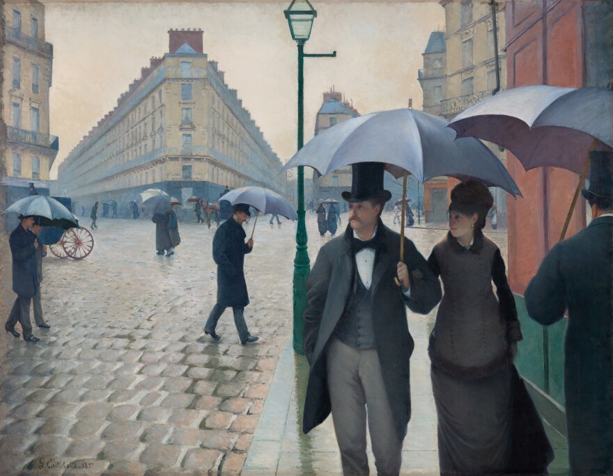 Caillebotte puts you right on the sidewalk in <em>Paris Street, Rainy Day,</em> 1877.