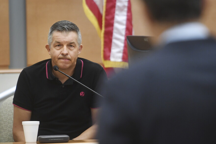 Ian Hockley, father of deceased Sandy Hook Elementary student Dylan Hockley, answers questions from lawyer Josh Koskoff during his testimony in the Alex Jones defamation trial at Superior Court in Waterbury, Conn. on Tuesday, September 27, 2022.