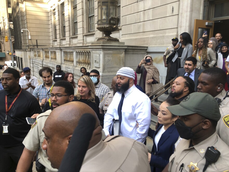 Adnan Syed, center, leaves the Elijah E. Cummings Courthouse in Baltimore. A judge has ordered the release of Syed after overturning his conviction for a 1999 murder that was chronicled in the hit podcast “Serial.”