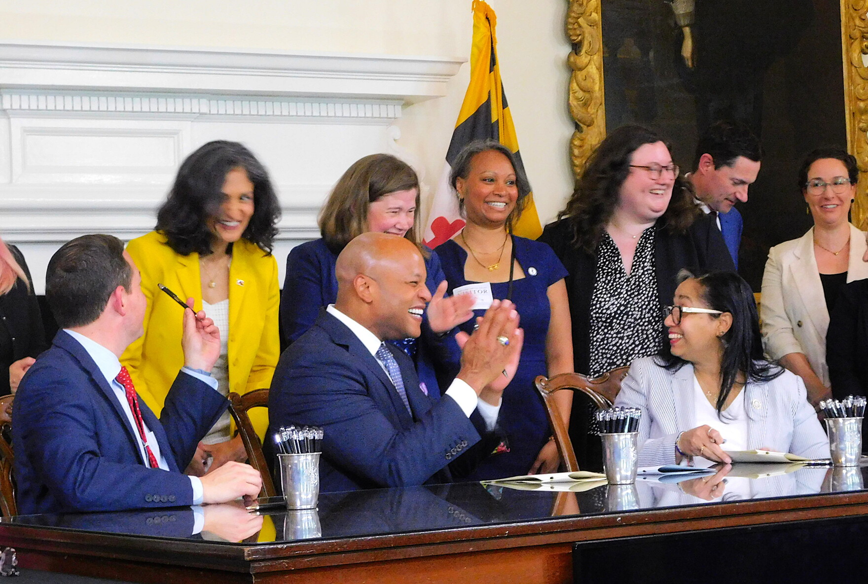 Moore signs over 140 bills into Maryland law; highlights Vax Act and ...