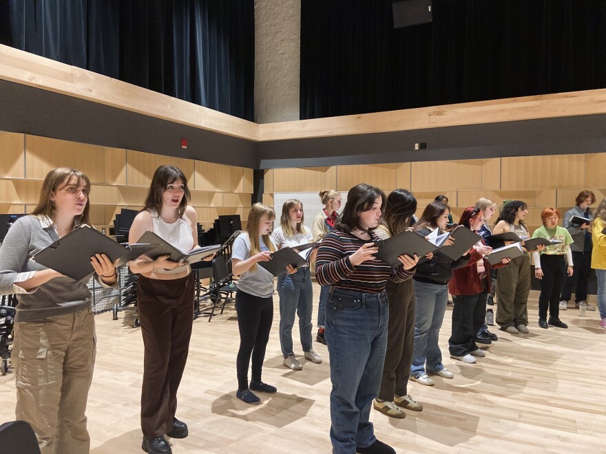 Interlochen Arts Academy choir members rehearsing