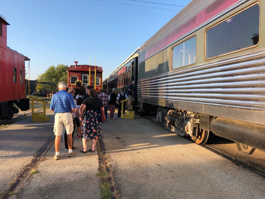 Passengers board the 8 a.m. Arkansas & Missouri Railroad excursion train to Van Buren.