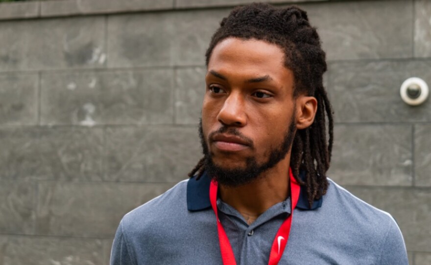 George Hawkins Jr. speaks with reporters on Friday outside the U.S. District Court for the Eastern District of Virginia in Richmond. (Photo courtesy - Connor Scribner/VPM News)
