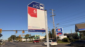 A bus stop sign for the Central Ohio Transit Authority Line 6 bus is in the Columbus Hilltop neighborhood.