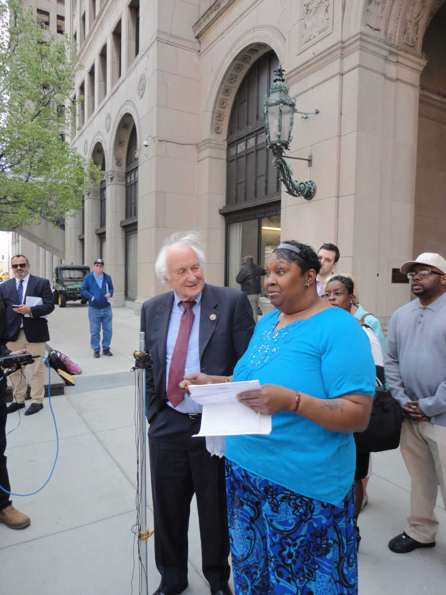 Blanche Jackson, right, with Rep. Sandy Levin. Jackson successfully appealed a finding of unemployment fraud, but the state still says she owes $4000.