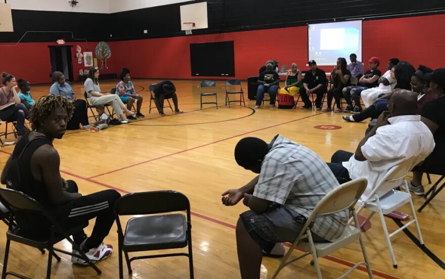 The Chicago-based anti-violence orgnaization Cure Violence spoke at the Napier Community Center in 2019 about treating gun violence as a public health epidemic.