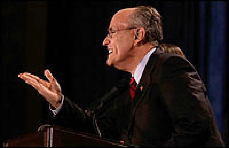 Giuliani blows a kiss to supporters at a hotel in Orlando, Fla., on Tuesday.