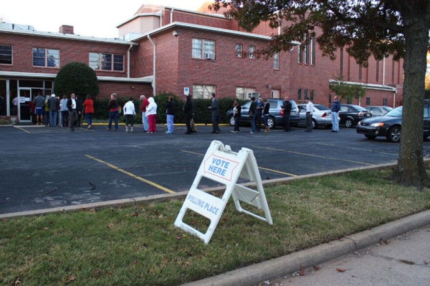 Voters line up to cast ballots shortly after precincts opened in Oklahoma City on Election Day in 2012.