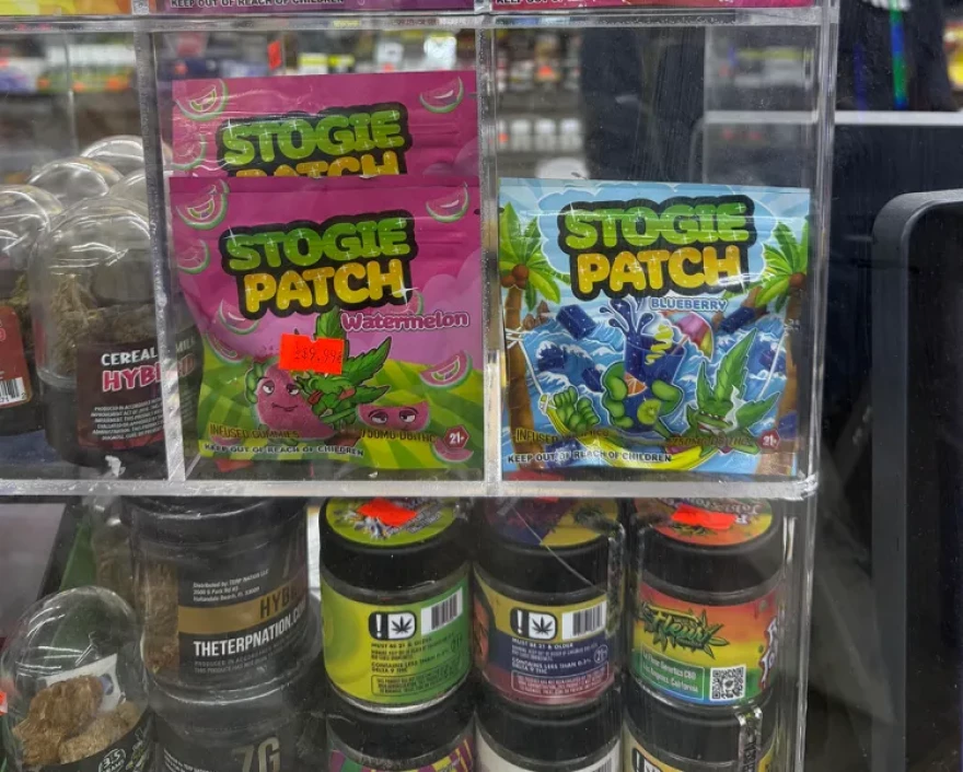 In many convenience stores that sell hemp, the products are behind the counter, even though it’s not illegal to sell hemp products to minors. These packages are also labeled “21+” and “keep out of reach of children.” Critics say the design, modeled after Sour Patch Kids, is intentionally designed to appeal to children.