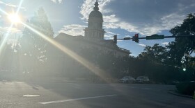 Athens City Hall stands across a downtown intersection.