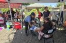 Nurse Diana Cavazos treats Alicia with the street nursing team in San Antonio.