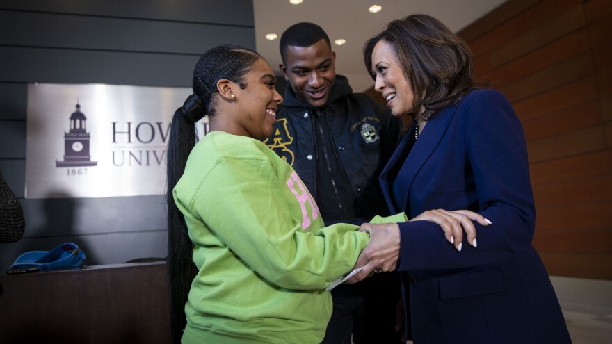 Sen. Kamala Harris visits the Washington, D.C., campus of her alma mater, Howard University, on the day she launched her presidential campaign in January 2019. She's seen speaking to Mara Peoples, executive vice president of the Howard University Student Association, and Amos Jackson III, the executive president.