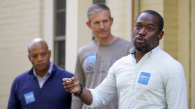 Maryland Gov. Wes Moore, back left, and Virginia Delegate Rodney Willett, back middle, look on as Richmond Mayor Levar Stoney speaks during a campaign rally for Virginia State Delegates Willett and Schuyler VanValkenburg on Nov. 4, 2023, Henrico, Va. Stoney announced Monday Dec. 4, 2023 that he will run for Virginia governor in 2025.
