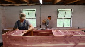 John Meyer builds coffins at his home near Seymour, Missouri.