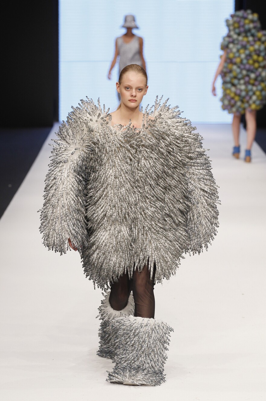 A model walks down the runway during the Maria Sofia Bahlner S/S 2013 Fashion Show from the Swedish School of Textiles during the Mercedes-Benz Stockholm Fashion Week.