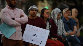 People, including University of Scrantons students, listen to prayers and reflections during a Pray-in & Vigil for Israel-Palestine at Lackawanna County Courthouse Square.