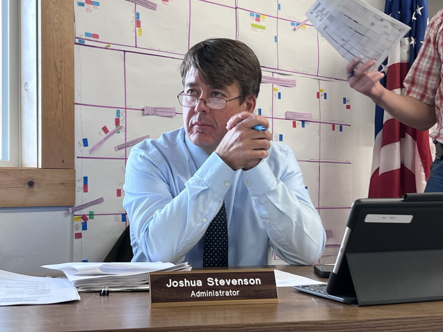 Cass County Administrator Josh Stevenson sits at a desk during the May 19, 2026, County Board meeting in May Town Hall.