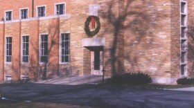 Image of a school building with a wreath above the door It's the old Trinity Lutheran in Bloomington.