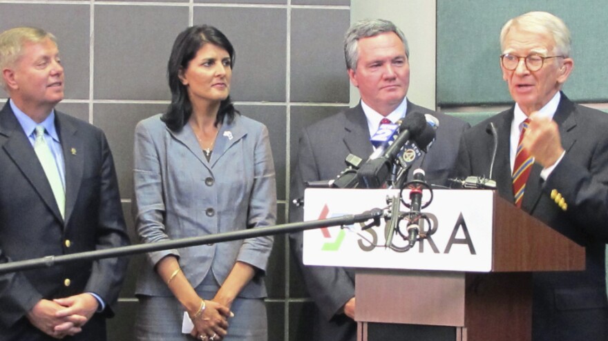 South Carolina Republican Sen. Lindsey Graham (from left), Gov. Nikki Haley and state House Speaker Bobby Harrell listen to Charleston Mayor Joseph Riley Jr. criticize a National Labor Relations Board complaint against Boeing in North Charleston, S.C., on April 21.